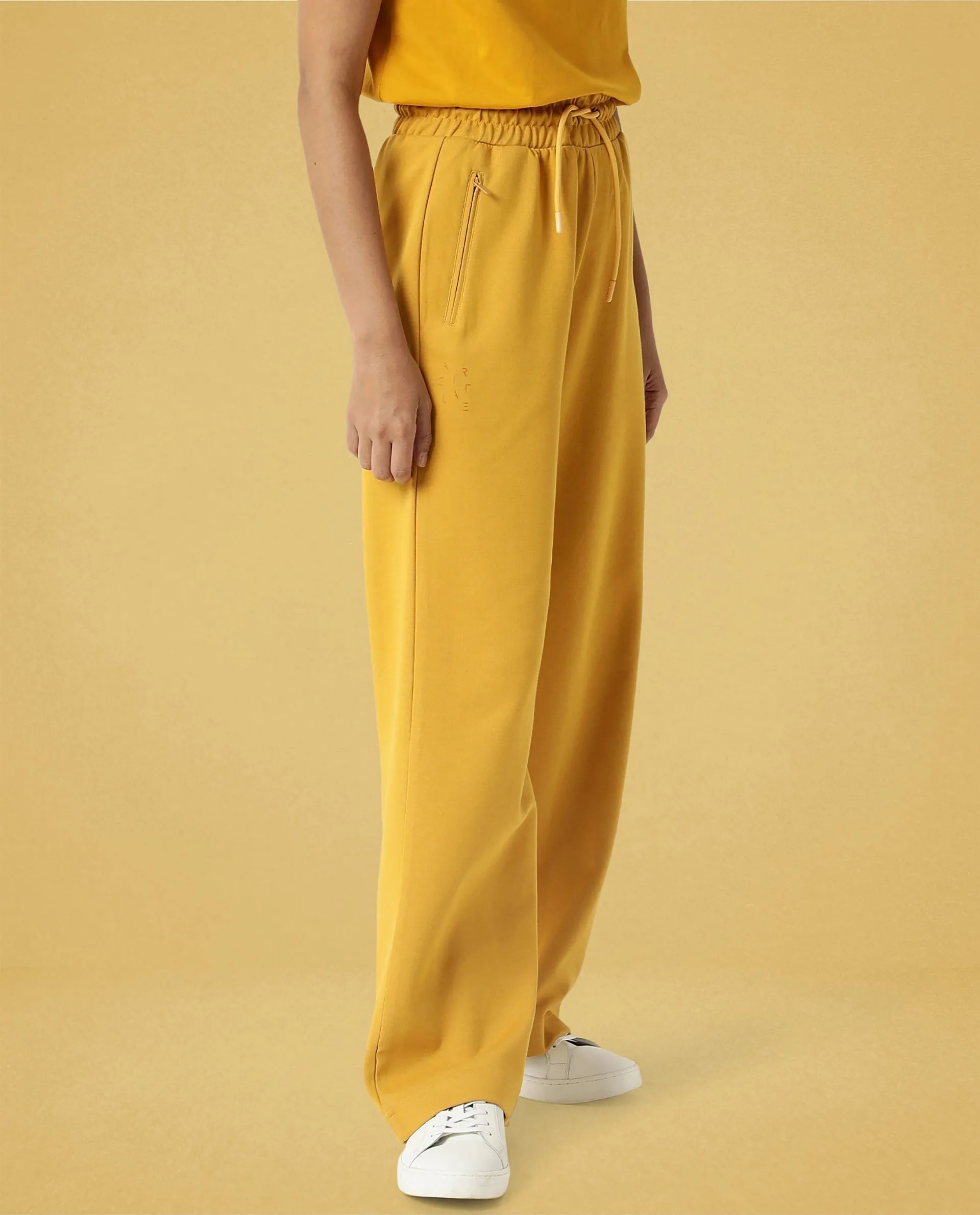 Rareism Women Capsule Mustard Cotton Blend Fabric Relaxed Fit Solid Mid Rise Ankle Length Track Pant