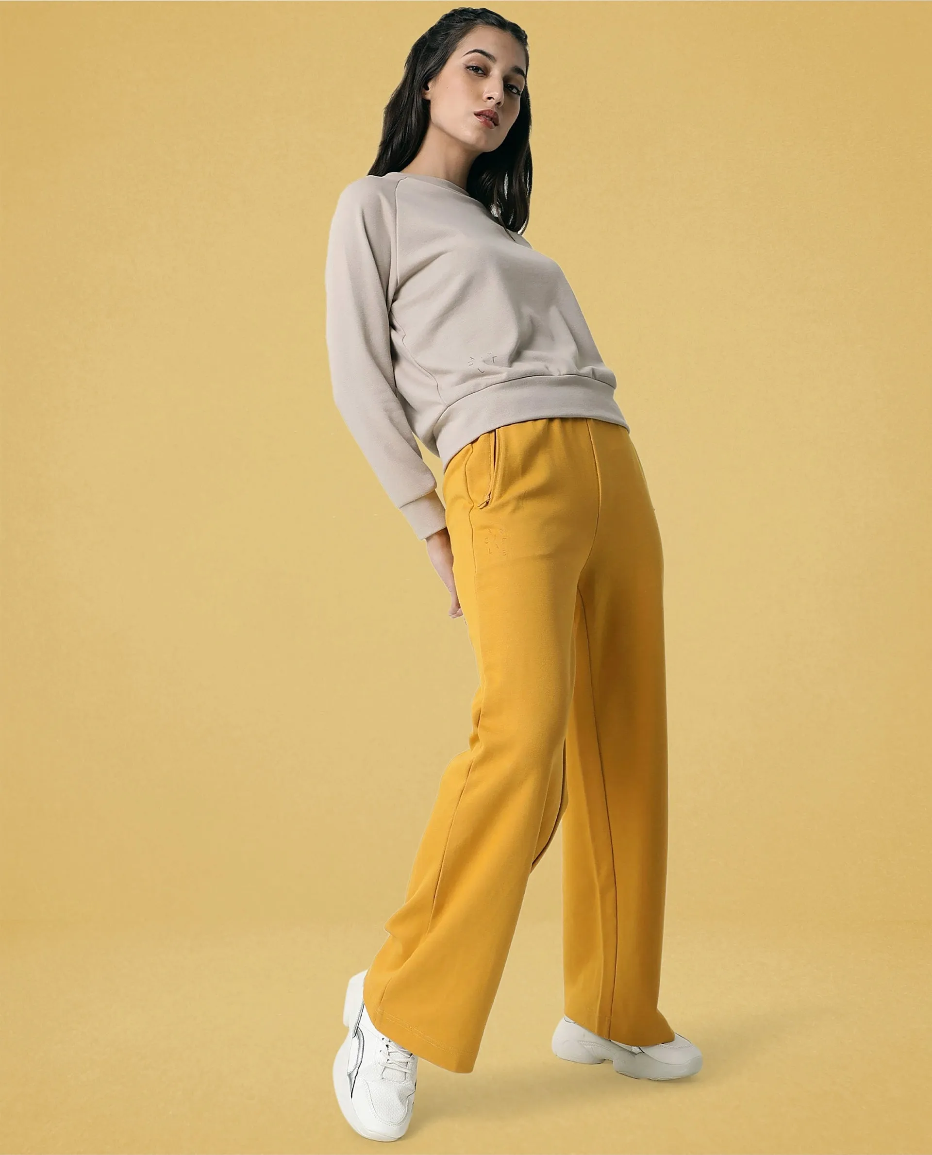 Rareism Women Capsule Mustard Cotton Blend Fabric Relaxed Fit Solid Mid Rise Ankle Length Track Pant