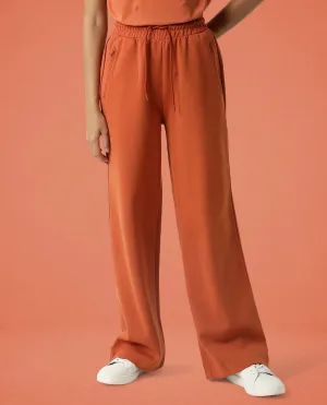 Rareism Women Capsule Orange Cotton Blend Fabric Relaxed Fit Solid Mid Rise Ankle Length Track Pant