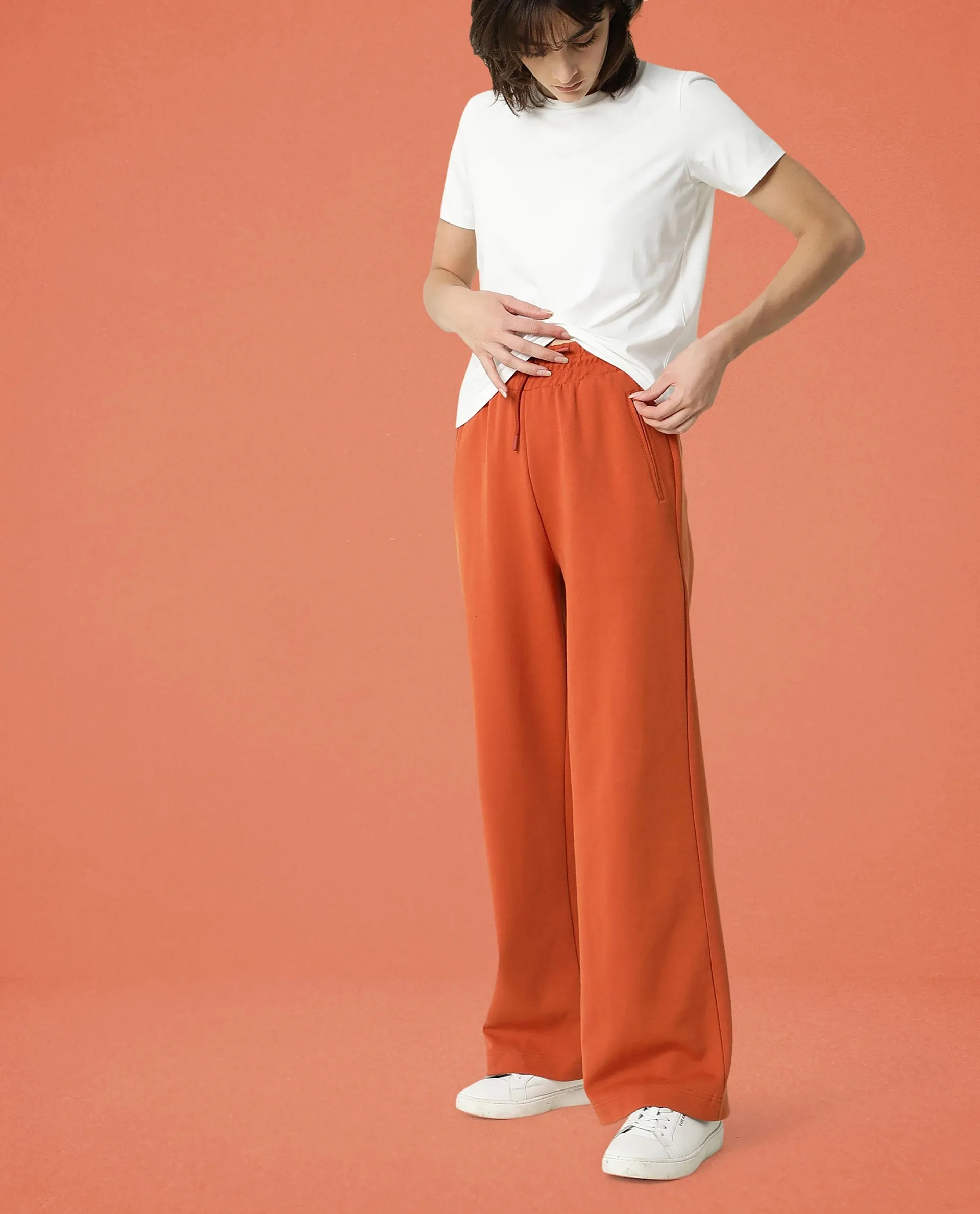 Rareism Women Capsule Orange Cotton Blend Fabric Relaxed Fit Solid Mid Rise Ankle Length Track Pant